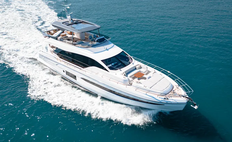 2025 Azimut Fly 78 luxury yacht cruising on open sea.